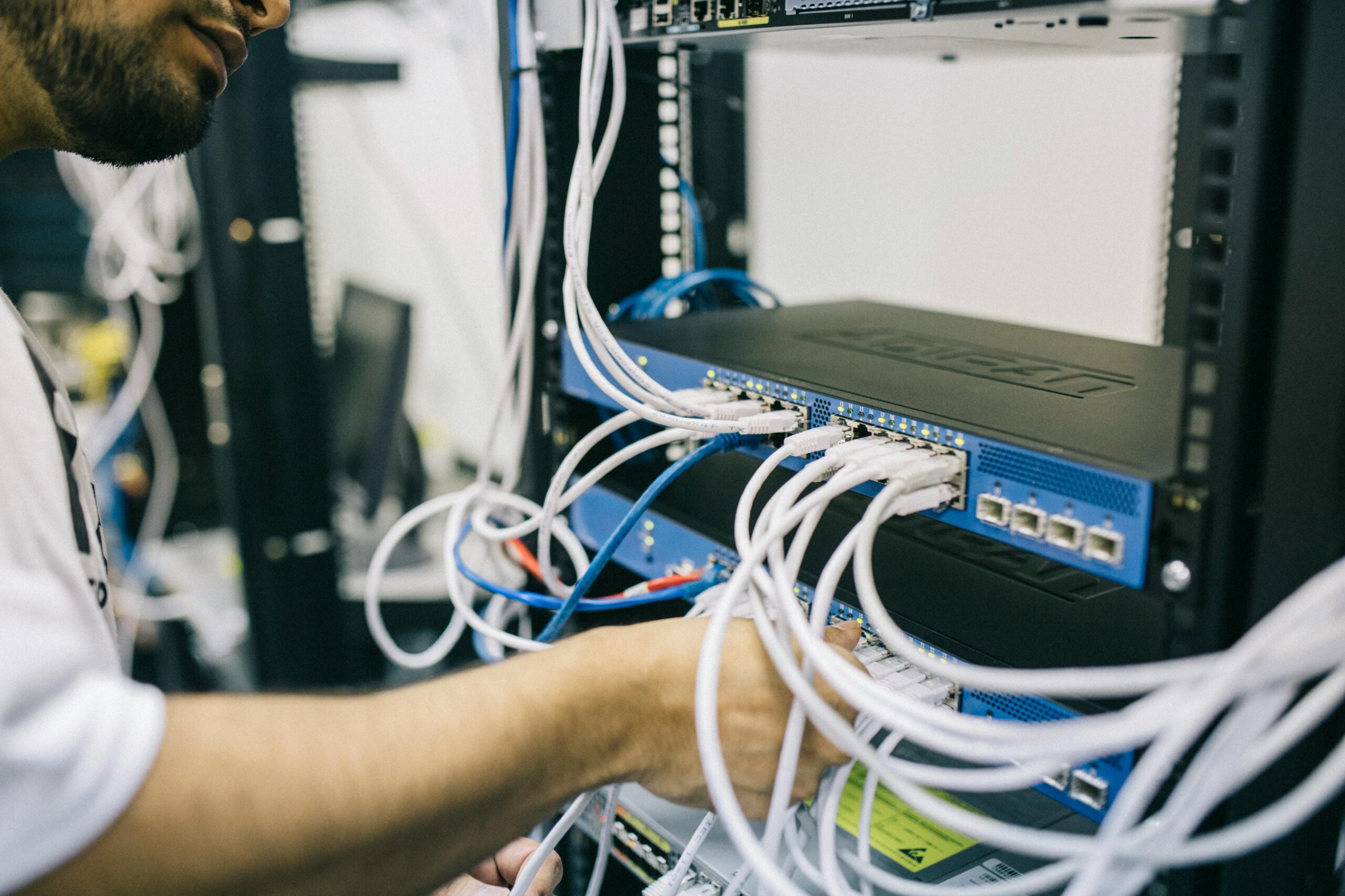 Engineer working on network equipment